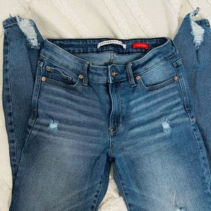 Celebrity pink distressed jeans